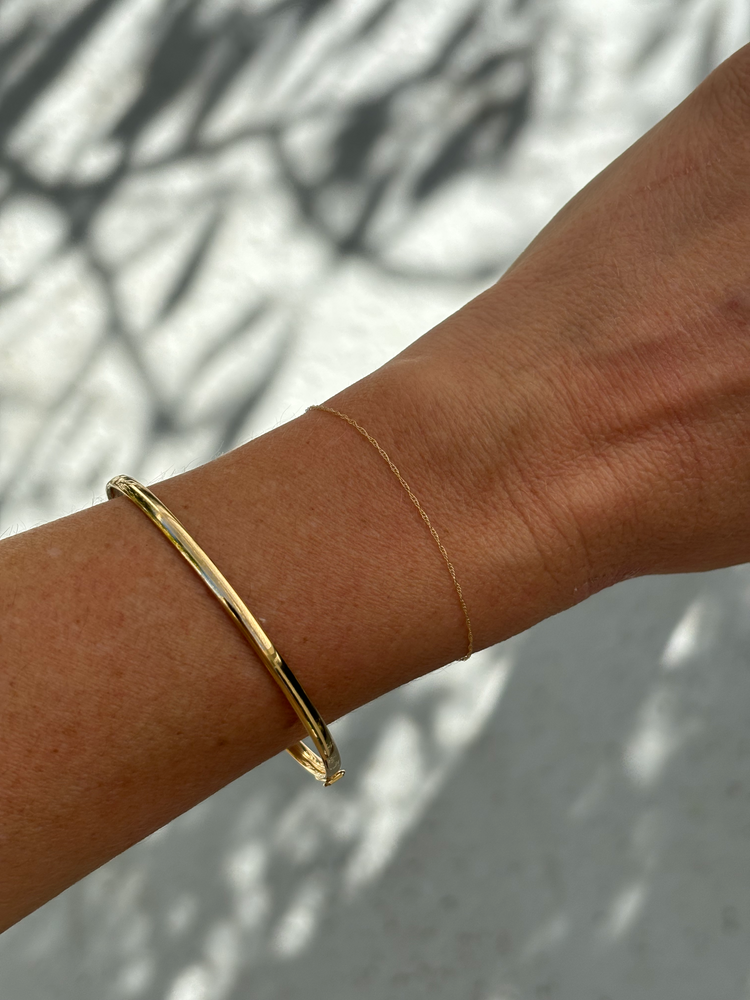 
                  
                    14k Gold Thick Bangle with Clasp
                  
                