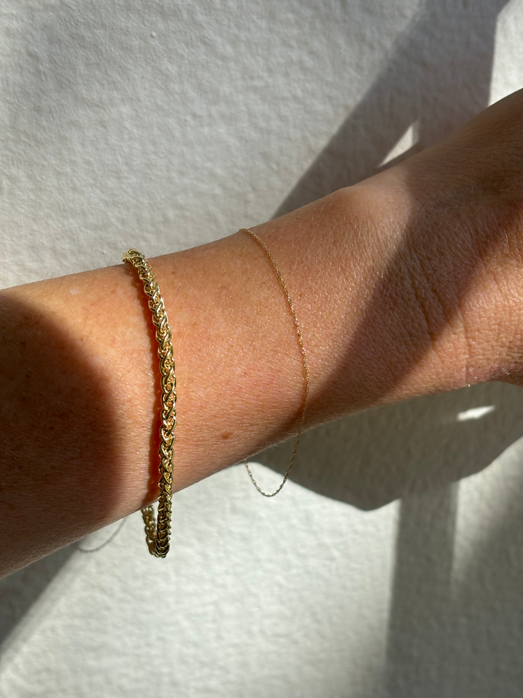 
                  
                    14k Gold Hollow Palma Wheat Chain Bracelet
                  
                