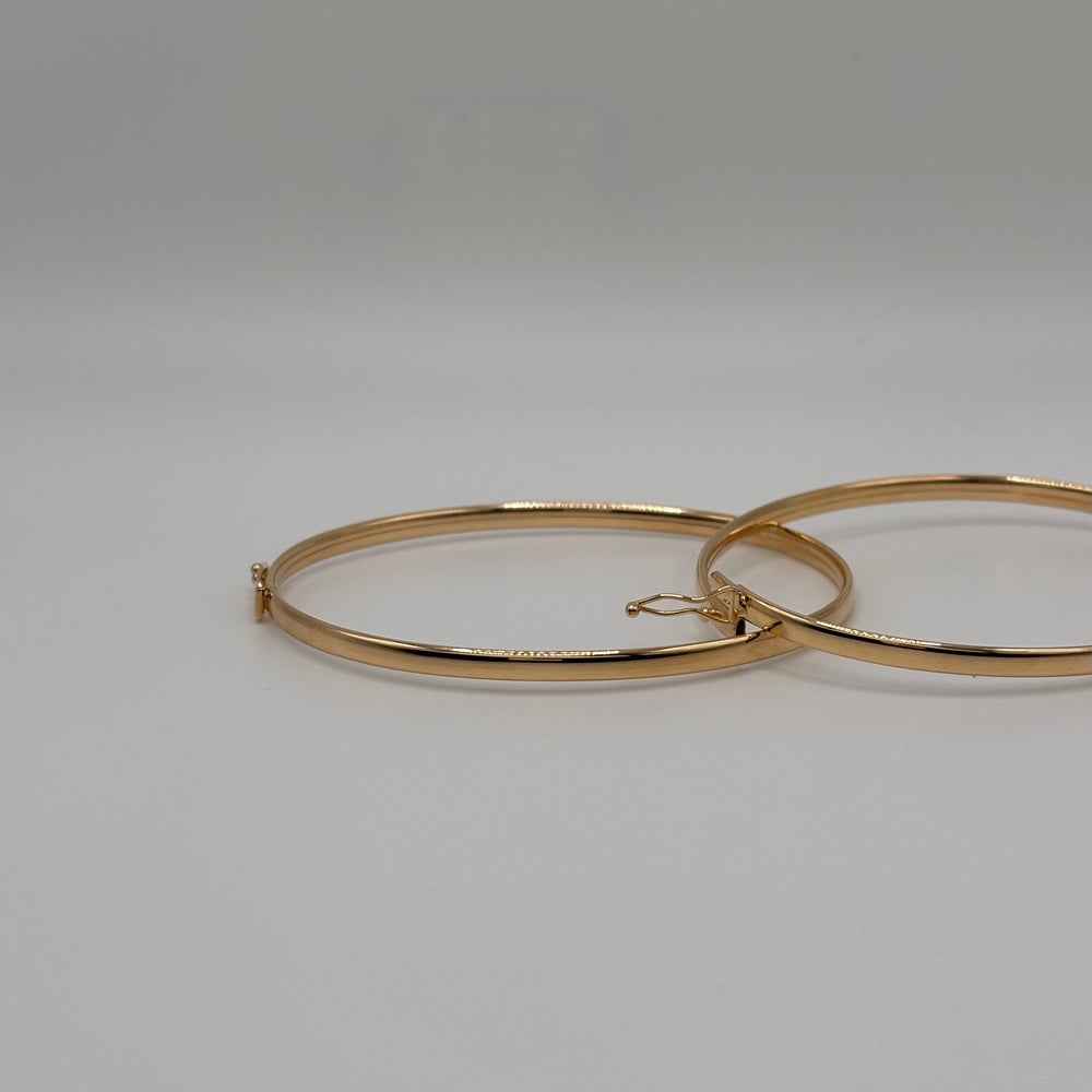 
                  
                    14k Gold Thick Bangle with Clasp
                  
                